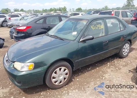 2001 Toyota Corolla Ce z USA, uszkodzony, nr VIN 2T1BR12E81C475853